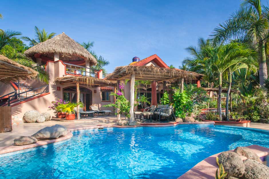 Luxury villa Las Mañanitas with private pool surrounded by lush greenery at Playa Las Tortugas, Mexico.